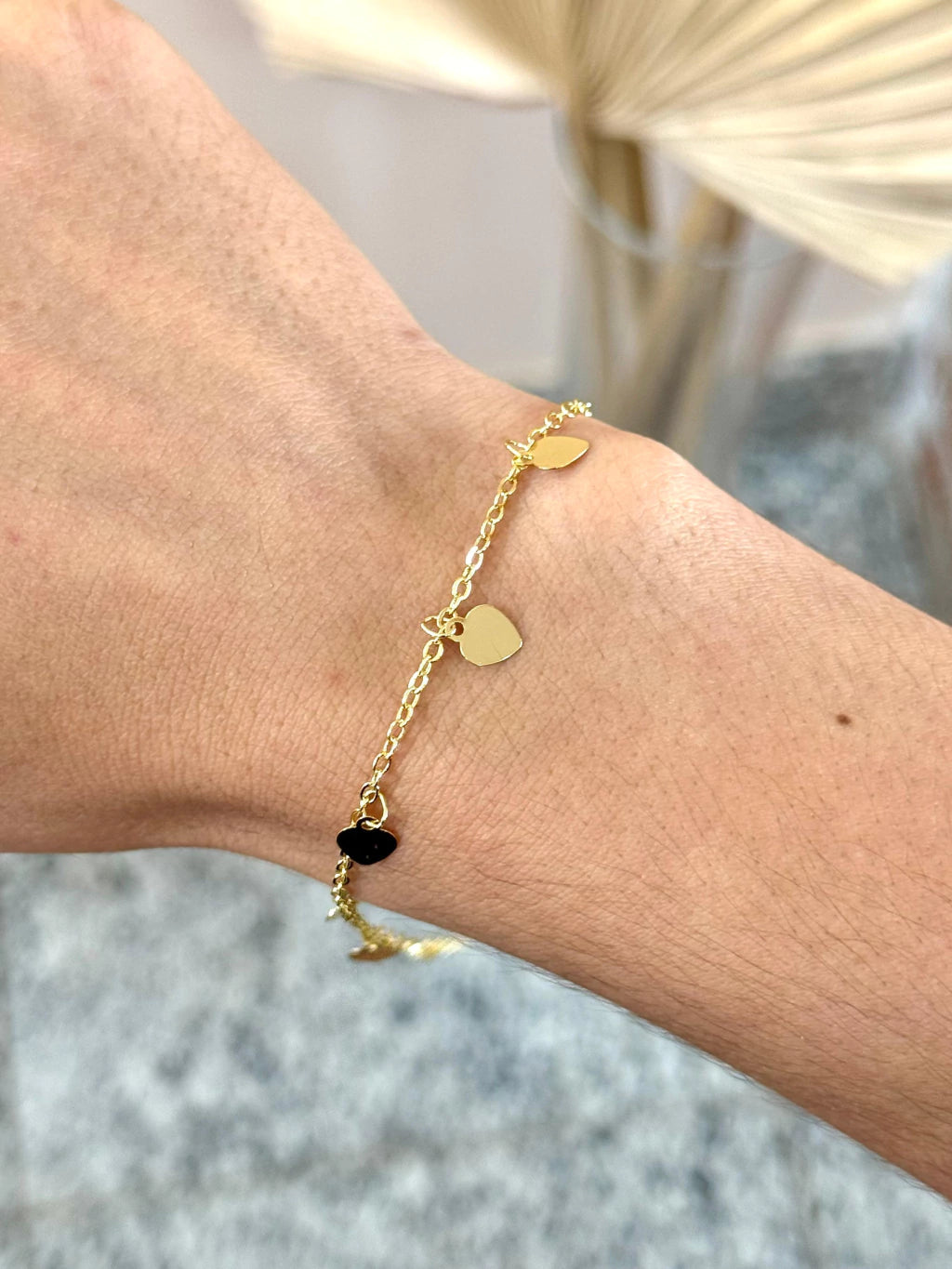 Pulseira corações pendurados