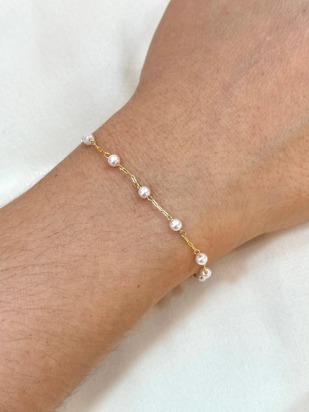 Pulseira mini pérolas