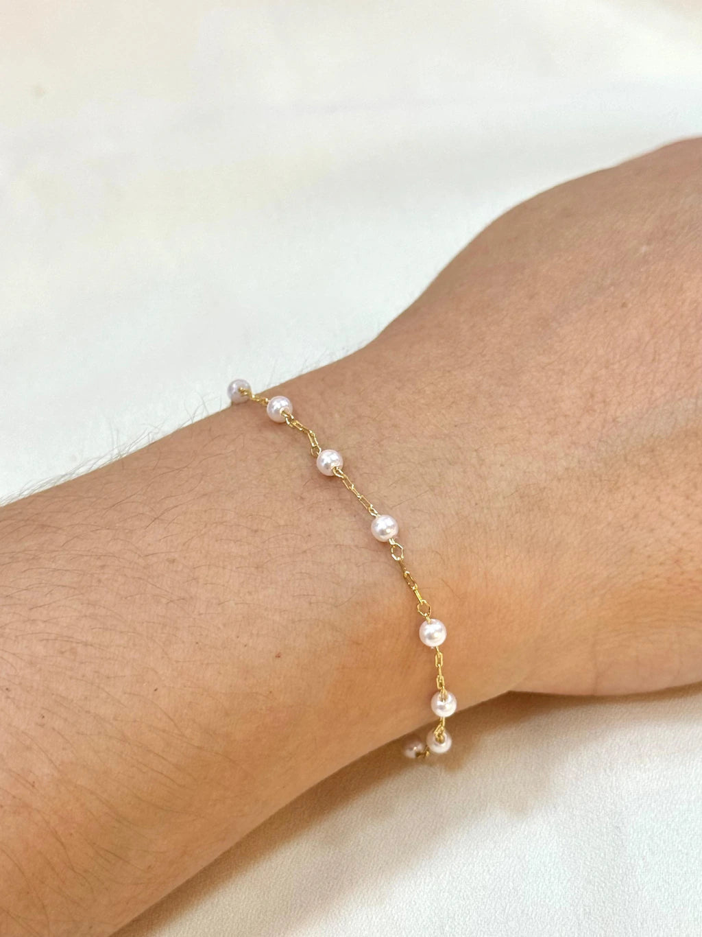 Pulseira mini pérolas