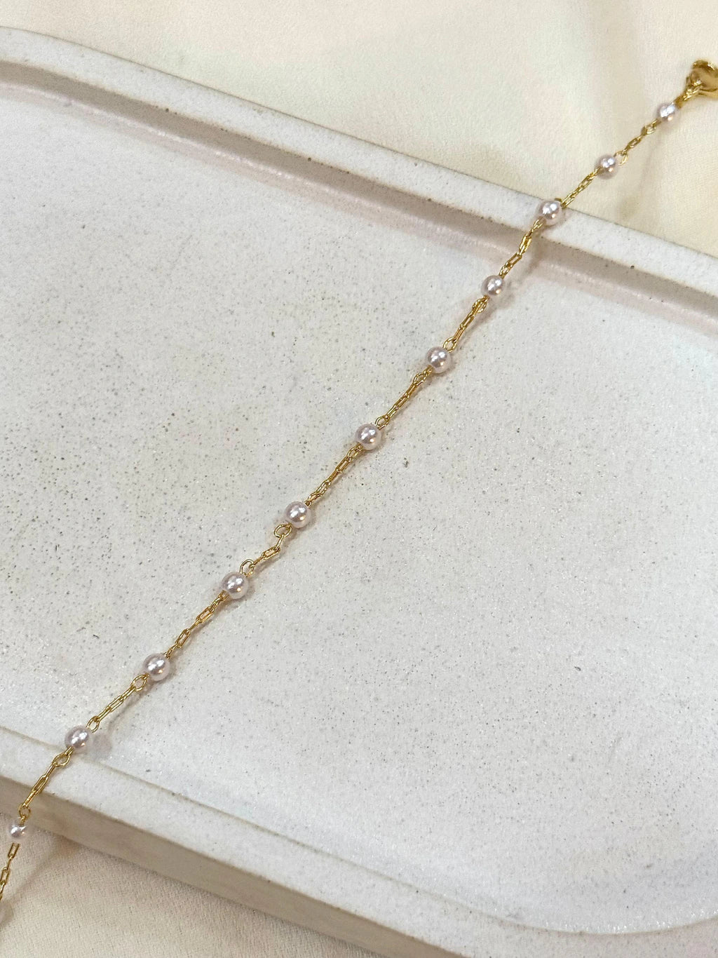 Pulseira mini pérolas