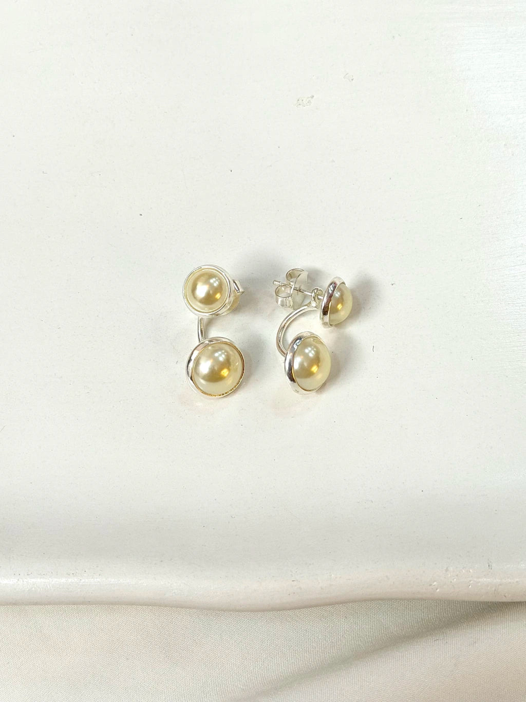 Brinco duas pérolas