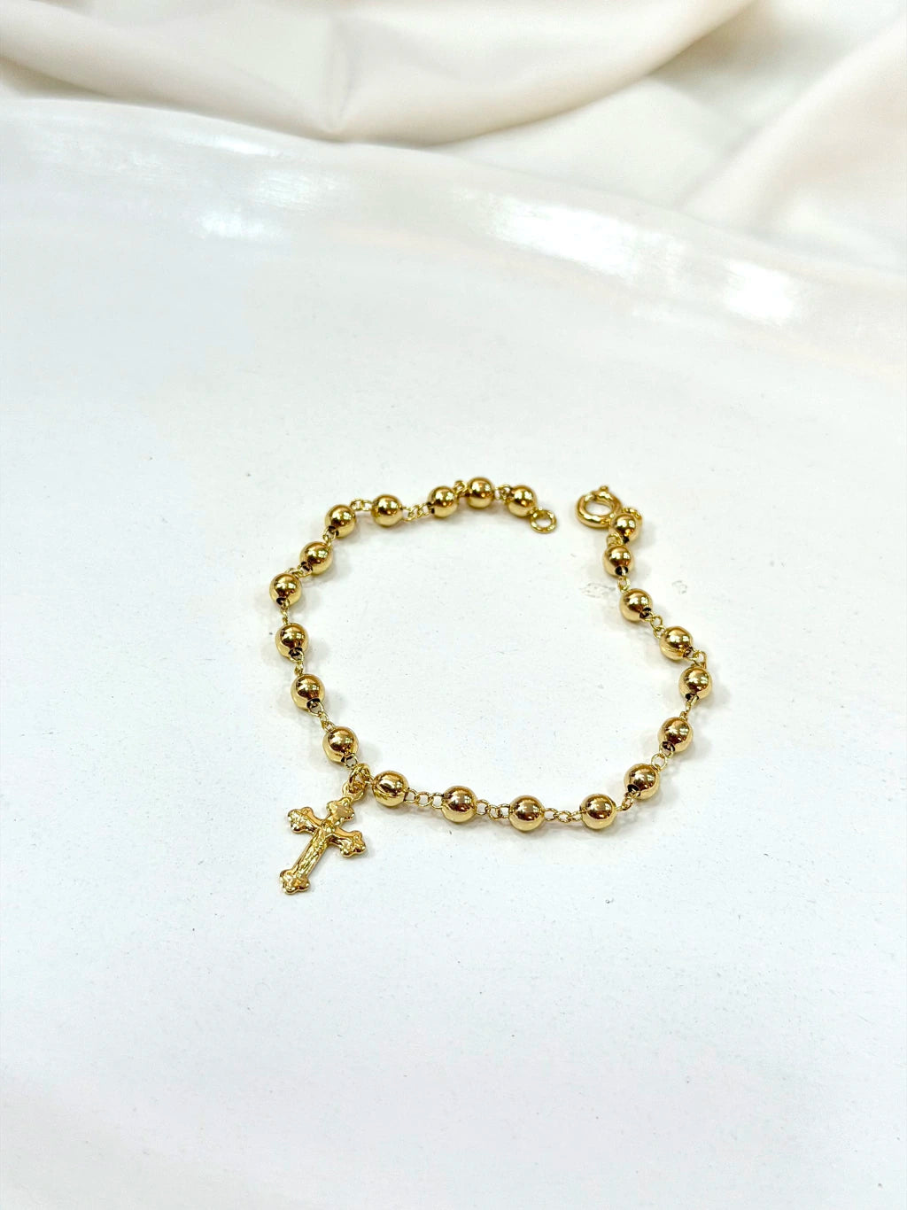 Pulseira bolinhas e cruz