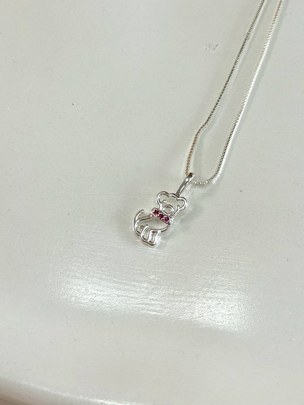 Cachorro detalhe rosa