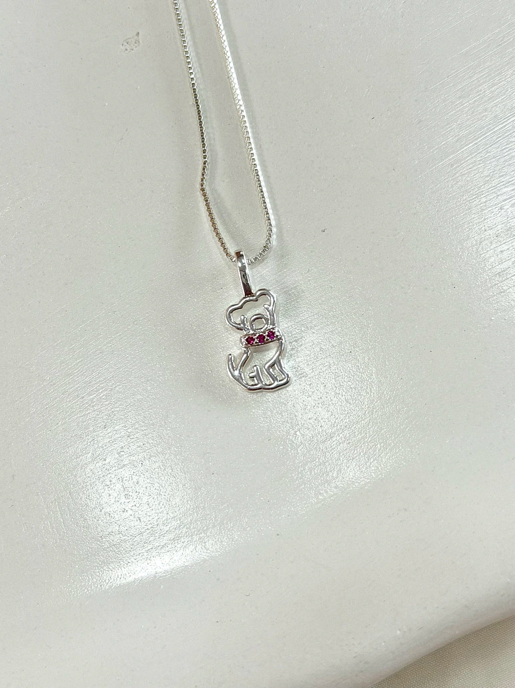 Cachorro detalhe rosa