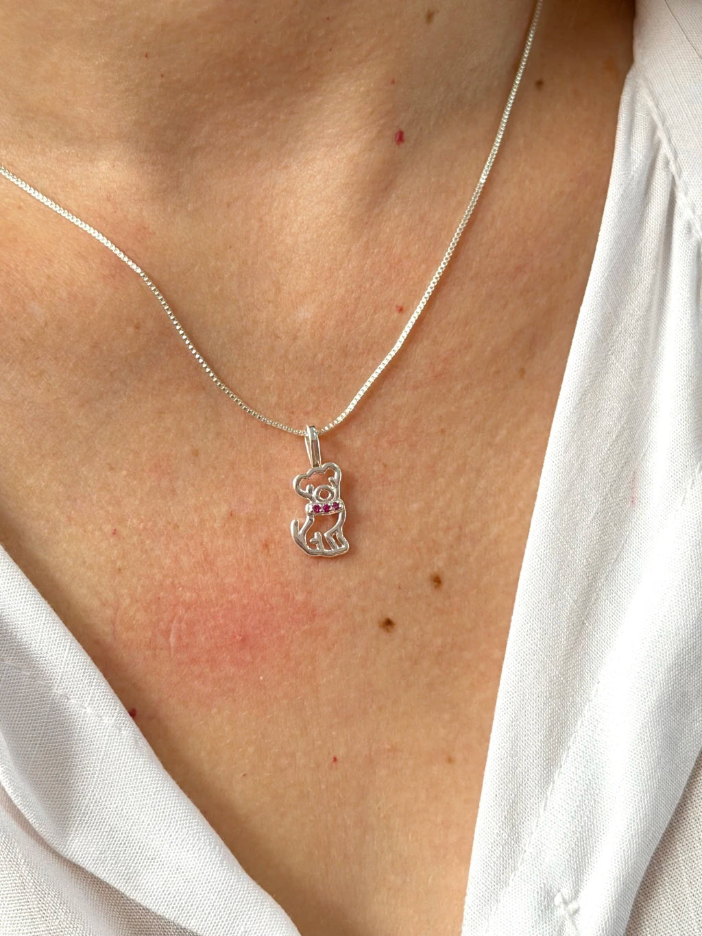 Cachorro detalhe rosa