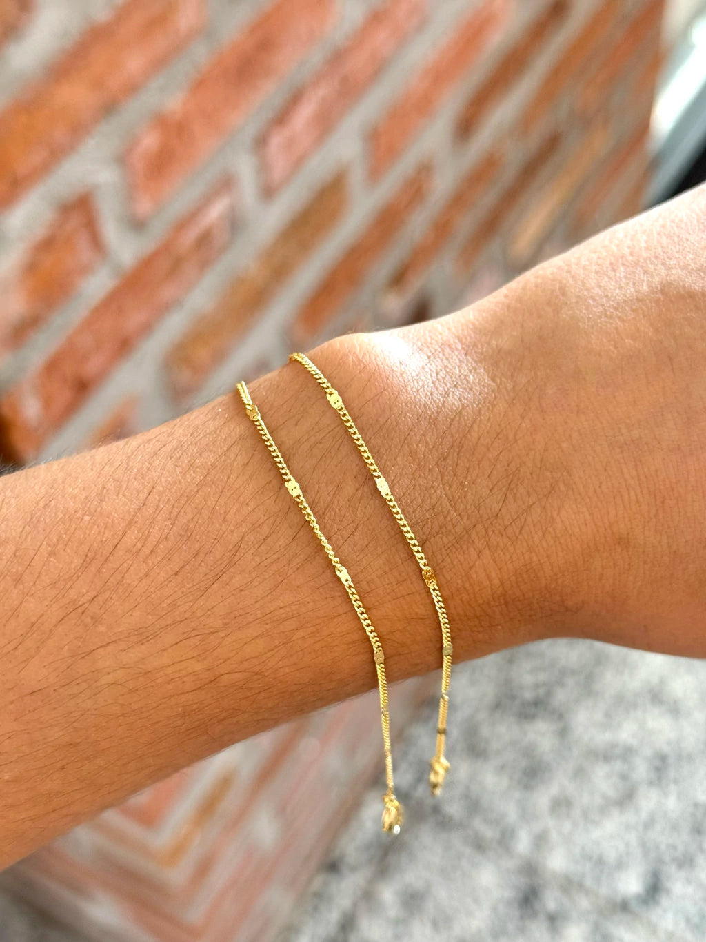 Pulseira grumet com chapinhas redondas