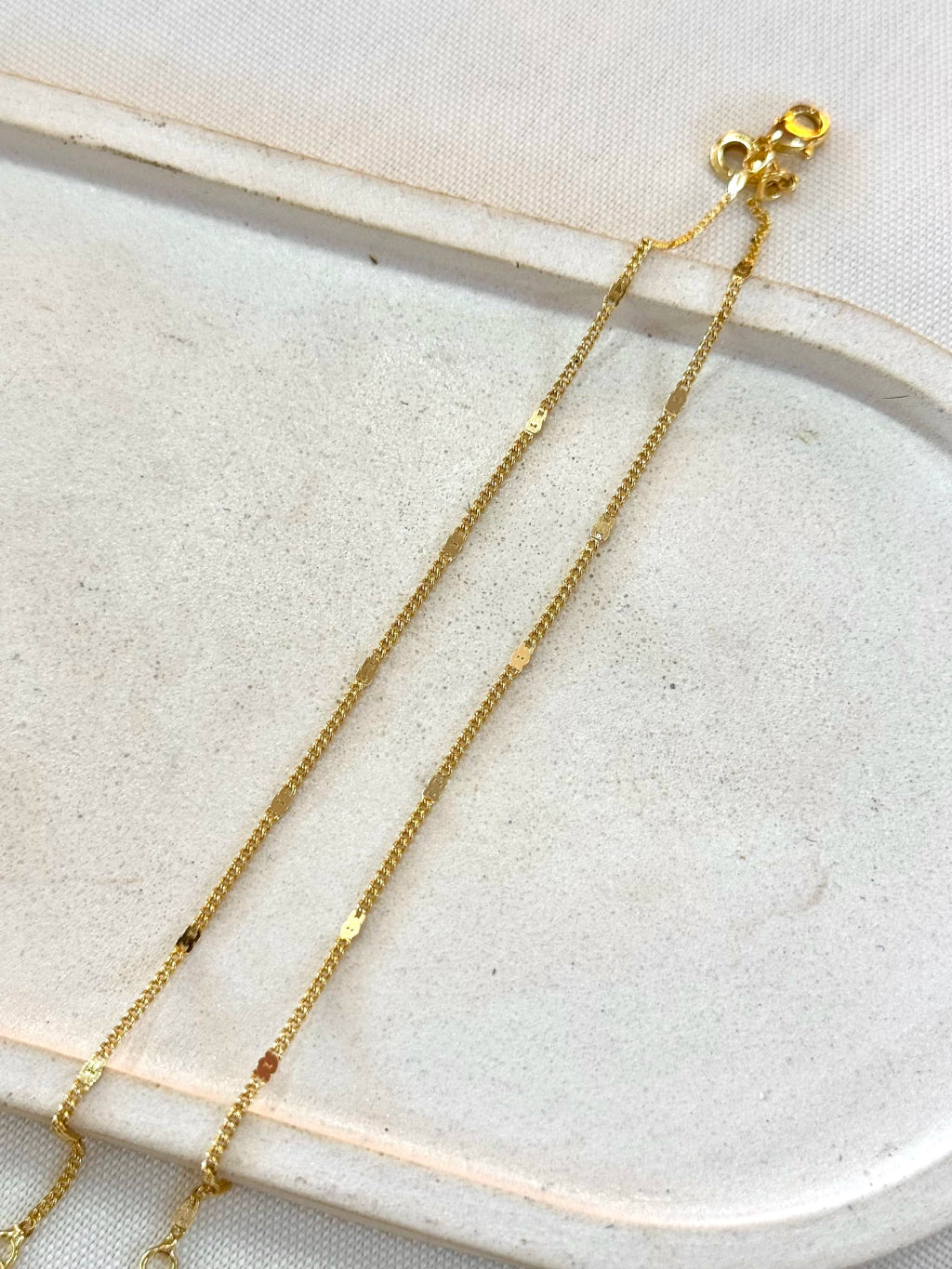 Pulseira grumet com chapinhas redondas