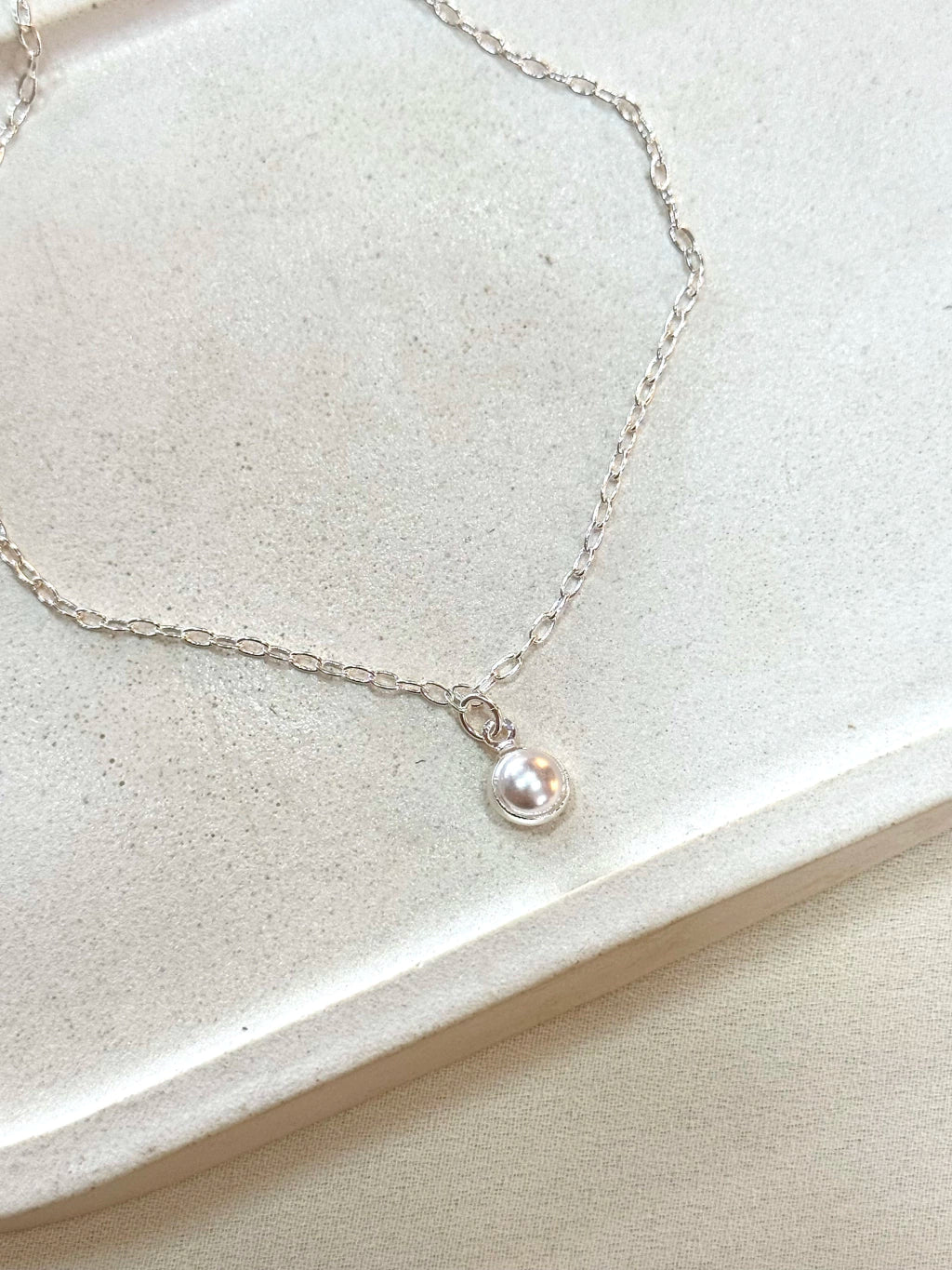 TORNOZELEIRA CADEADINHO COM PÉROLA 6MM