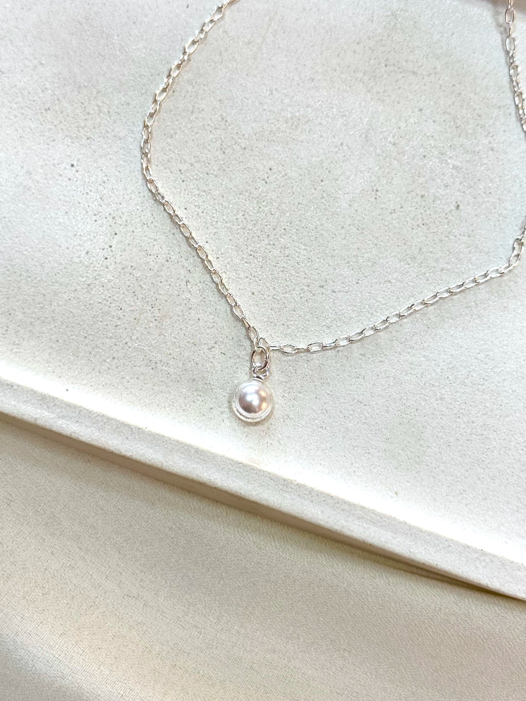 TORNOZELEIRA CADEADINHO COM PÉROLA 6MM